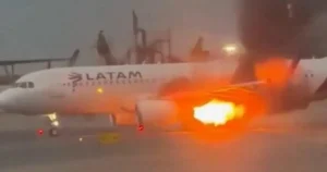 Passenger jet engine shoots out flames before takeoff