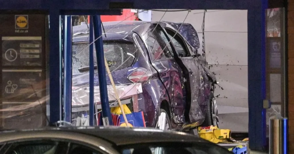 Man dies after car crashes into front of busy Lidl