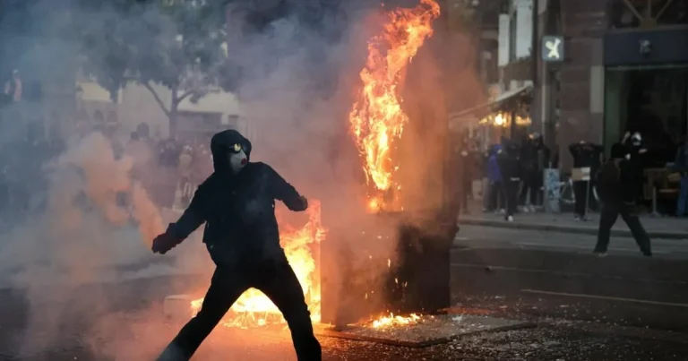 France riots in pictures: Protests of 400,000 descend into anarchy as police fire tear gas