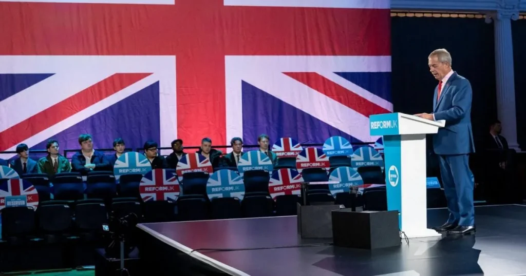 Nigel Farage lashes out at Reform ‘incompetence’ after speech in half-empty hall