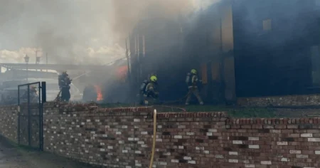 Families told to keep windows shut after car catches fire and destroys home